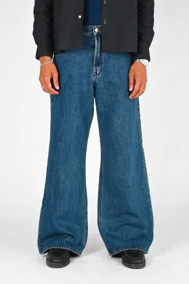 Pseushi Baggy Jeans in Medium Wash